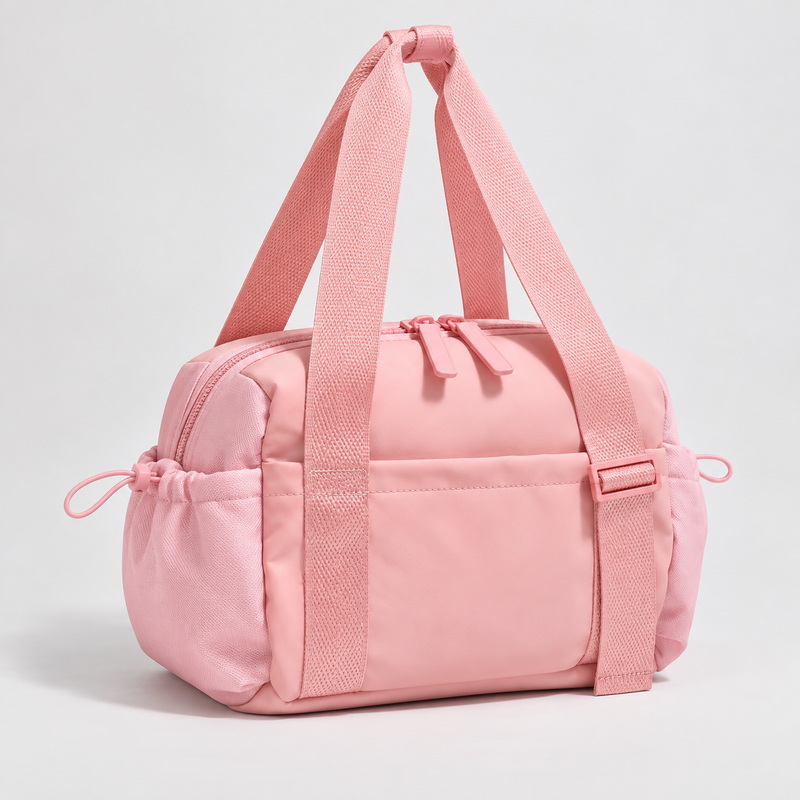 TUSK Essentials Bag in black, small nylon gym and studio bag with adjustable shoulder strap